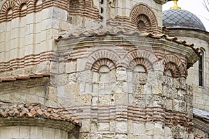 Close-up of masonry elements of facade oldest church of St. John the Baptist. Famous Church of St. John the Baptist was built in 8