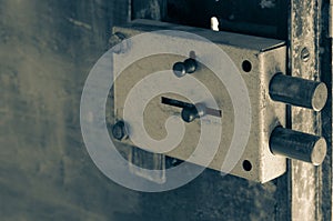 Close-up of a massive door lock on a metal door