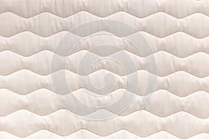 Close up mattress texture. Comfortable sleep concept. New modern mattress, for background. .