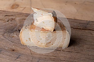 close up of maturated selection of cheese on old wood