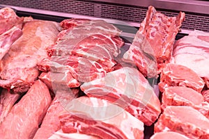 Close up of meat in a supermarket. Raw meat at butcher shop