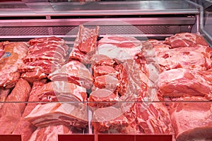Close up of meat in a supermarket. Raw meat at butcher shop