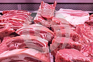 Close up of meat in a supermarket. Raw meat at butcher shop