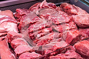 Close up of meat in a supermarket. Raw meat at butcher shop