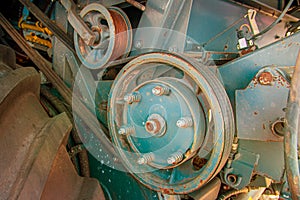 Close-up of the mechanism of an agricultural grain harvester