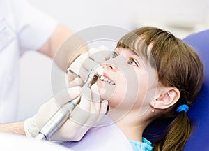 Close-up medical dentist procedure of teeth polish
