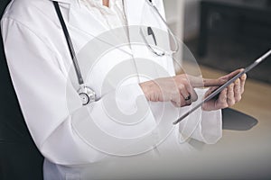 Close up Medical Doctor Using Tablet Computer