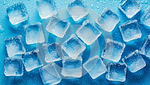 Close-up of melting ice cubes isolated on blue background. Frozen water blocks. Flat lay