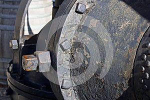 Close up of Metal Bolts on an Eroded Metal Pipe