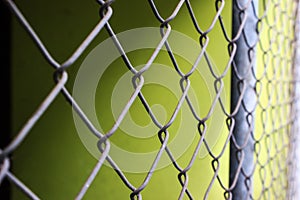 Close up metal chain-link fence pattern background