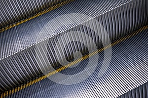 Close up metal escalator, diagonal view