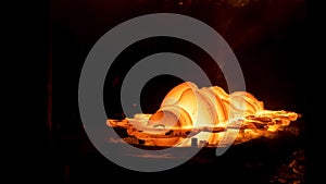 Close up of metal forging process of a metal detail at the metallurgical plant. Scene. The production of metal detail in