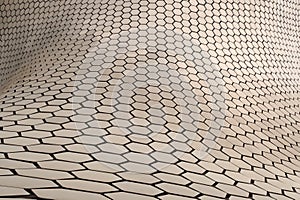 Close up on the metal hexagons forming the facade of the famous Soumaya Museum, Mexico City photo