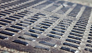 Close up of the metal manhole cover