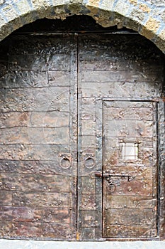 Close-up of metal massive door in ancient fortress Gonio, Georgia