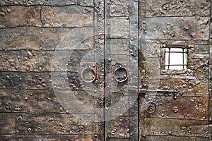 Close-up of metal massive door in ancient fortress Gonio, Georgia