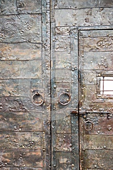 Close-up of metal massive door in ancient fortress Gonio, Georgia