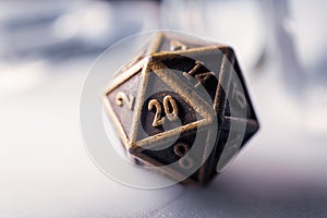Close-up of a metallic d20