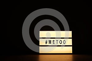 Close up of ` METOO` text in lightbox. Female empowering educational movement.