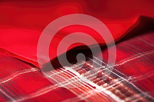 close up of a micro sd card on red fabric