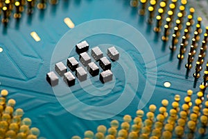 Close up of microchips and pins on Main CPU PC processor circuit board