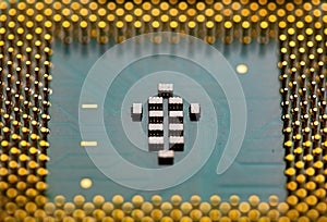 Close up of microchips and pins on Main CPU PC processor circuit board