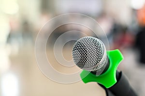 Close up of microphone in conference room on blurred background