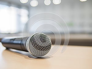 Close-up of Microphone in meeting room with bokeh light