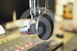 Close-up of a microphone in radio station broadcasting studio