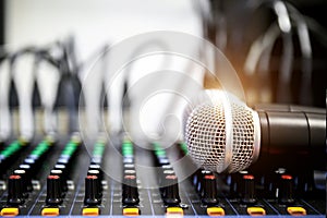 Close-up microphone and sound mixer in studio for sound record control