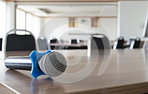 Close up microphone on table in seminar room