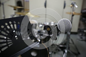 Close up of microphone with vintage picture style. Music equipment in training room