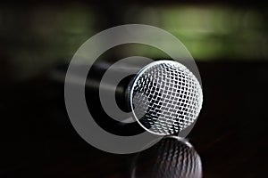Close up Microphone voice speaker on dark background. radio microphones. wireless sound transmission system. soft focus Two mics C photo