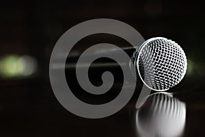 Close up Microphone voice speaker on dark background. radio microphones. wireless sound transmission system. soft focus Two mics C photo