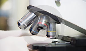 Close up microscope in laboratory.