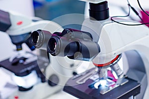 Close-up of microscopes at laboratory