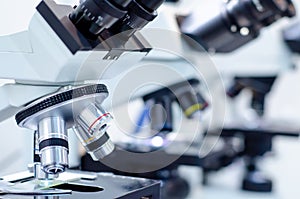 Close-up of microscopes at laboratory
