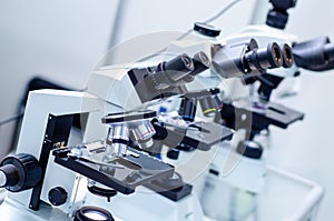 Close-up of microscopes at laboratory