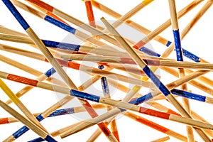 Close-up of Mikado sticks on white background