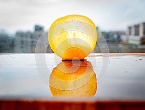 Close-up of a Mirabelle plum, a small yellow plum that is sweet in its taste and tropical