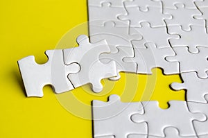 Close up of missing jigsaw puzzle pieces. Solution concept