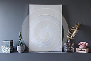 Close-up of mockup of white empty poster in grey living room int