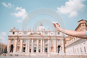 Close up model plane in Vatican city and St. Peter`s Basilica church, Rome, Italy.