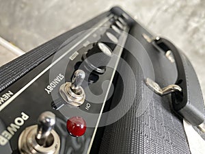 Close-up modern amplifier with black knob and control panel. clean and hi-gain distortion for rock to metal, Blues