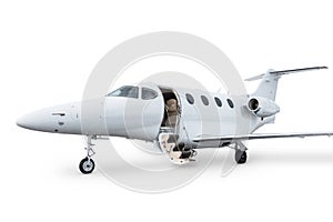 Close-up of the modern business jet with an opened gangway door isolated