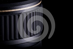 Close up of Modern Camera Lens Captured Against Black Background