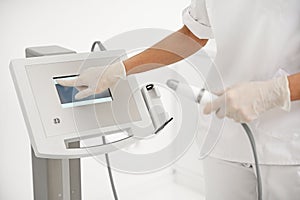 Close-up of modern cosmetological apparatus, medical equipment for beauty treatment in modern wellness spa center. Anti-aging,