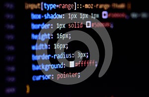 Close-up of modern CSS3 cascade style sheet programming code for HTML coding.