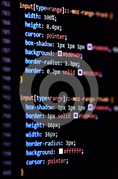 Close-up of modern CSS3 cascade style sheet programming code for HTML coding. Vertical photo.
