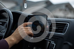 Close-up of modern GPS navigation system for car.